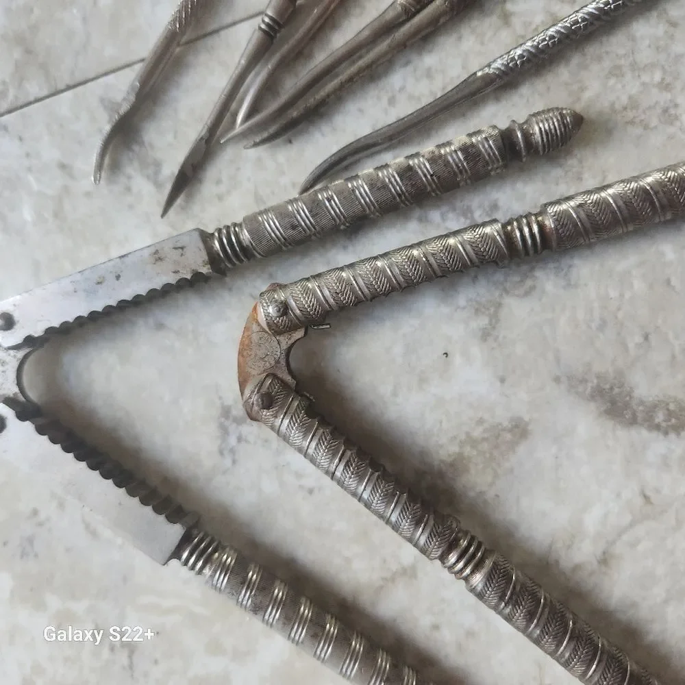 Silver metal Vintage Embossed Nutcracker & Six Picks set